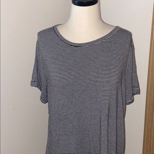 Black and white small striped shirt .